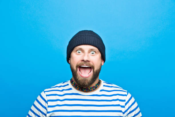 istock Portrait of excited bearded sailor screaming 928387902