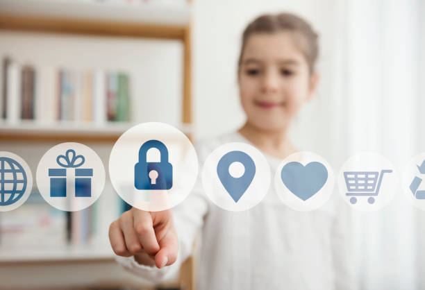 Little girl touching the security button on the digital screen child, internet, security, social media online safety stock pictures, royalty-free photos & images