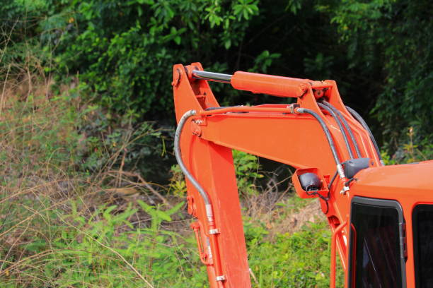 istock bucket small excavator orange crawler bulldozer in working 928395588