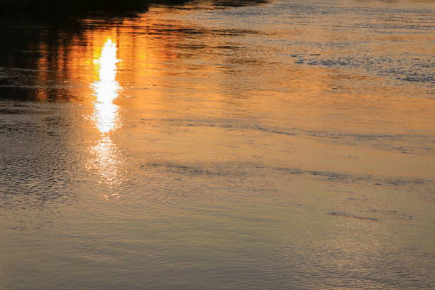 Sunset reflected in the Okawango river, Caprivi Strip Namibia Africa