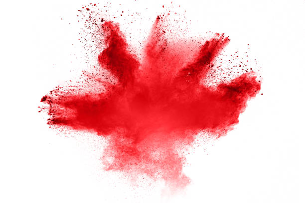 istock abstract red dust explosion on  white background. abstract red powder splattered on white background, Freeze motion of red powder splash. 928396268