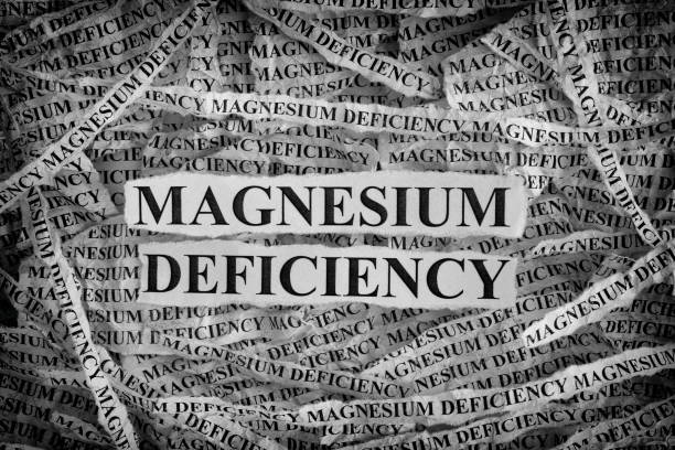 Magnesium Deficiency. Torn pieces of paper with words Magnesium Deficiency. Magnesium Deficiency. Torn pieces of paper with words Magnesium Deficiency. Concept Image. Black and White. Closeup. magnesium deficiency stock pictures, royalty-free photos & images