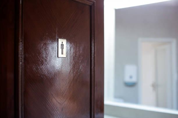 istock Men toilet sign 928399406