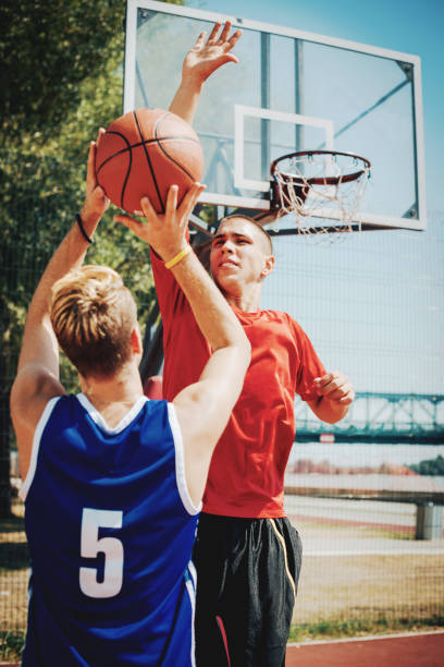 istock Score for three in basketball game 928400782
