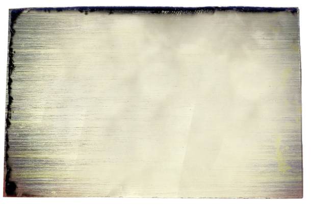 istock Grunge scratched black and white metallic texture background. 928400860