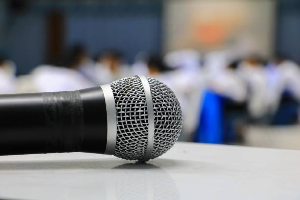 istock microphone wireless in a meeting room seminar conference background 928404222