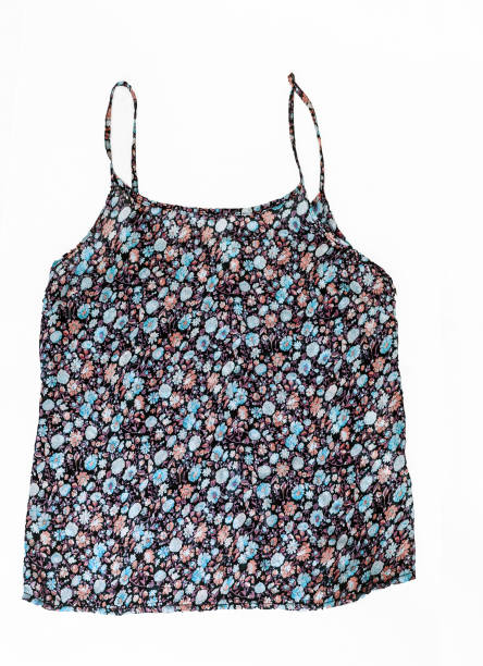 Colored sleeveless shirts with a trendy floral pattern, isolated on a white background