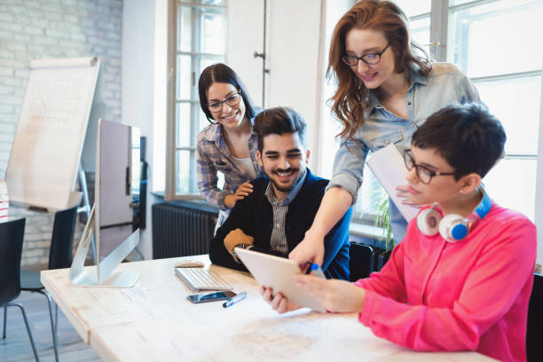 istock Company coworkers discussing ideas and brainstorming 928410544