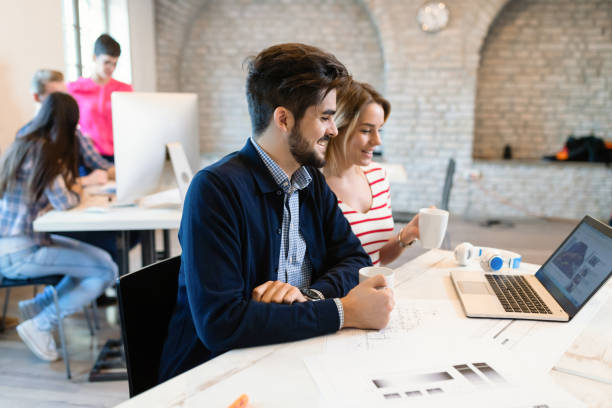 istock Business people having fun in office 928410644