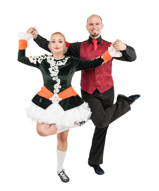 istock Beautiful couple Irish dancers isolated 928411472