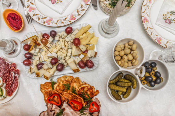 istock salad with shrimp on a festive table. Top view 928411624