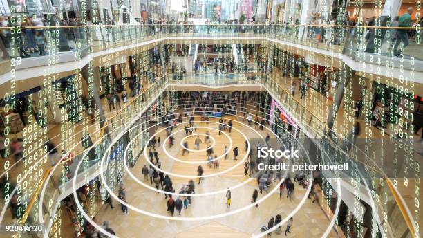 Phone Sending Out A Signal In A Matrix Styled Shopping Mall Stock Photo - Download Image Now