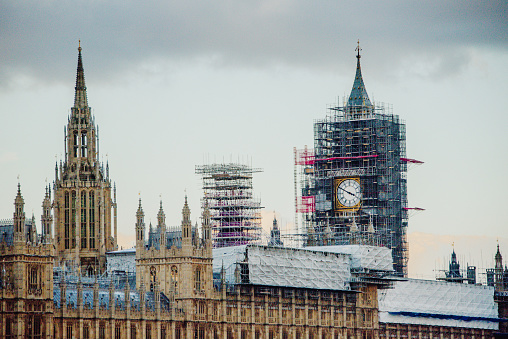 The houses of Parliament building in Lodon with scaffoldings