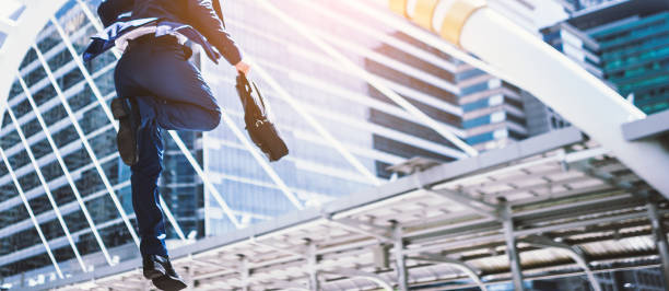 istock Carear Jumping running business man 928414432