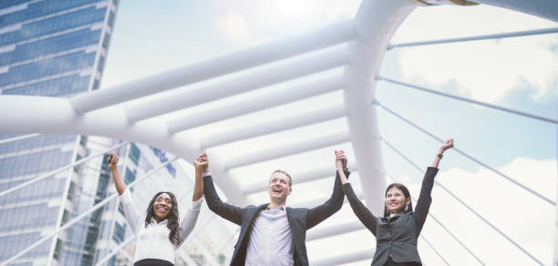 istock Business people celebrating success winning 928414436