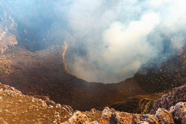 Masaya Volcano Crater The active volcanic crater of Masaya with gas emissions (sulphur dioxide) located between the cities of Granada and Managua, Nicaragua, Central America. masaya volcano stock pictures, royalty-free photos & images