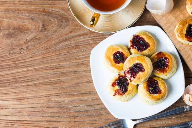 istock English scones with cream and strawberry jam 928426708