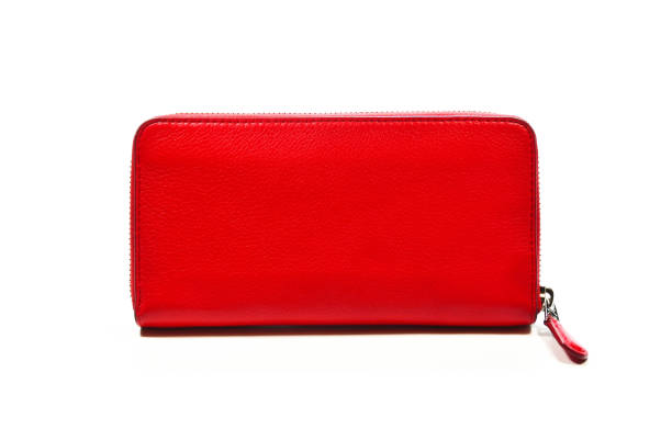 istock Red female wallet with zipper isolated on white background 928434294