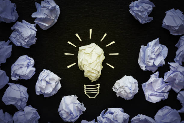 Creative Eureka Moment Illustrated image of a lightbulb made from crunched up pieces of paper. This image illustrates the creative process and the epiphany experienced when thinking outside the box. New ideas can help start a new business or an artistic endeavour. lifehack stock pictures, royalty-free photos & images