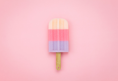 Table top view aerial image of sign or food of summer season holiday background concept.Flat lay of pastel ice cream on modern rustic pink paper backdrop.Minimalism creative design.