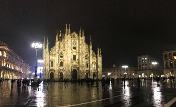 istock Milan: Piazza Duomo; Rainy Winter Night with People 928442846