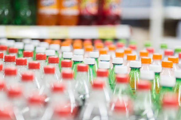 istock Rows of  plastic bottles cap with bllur background 928445730