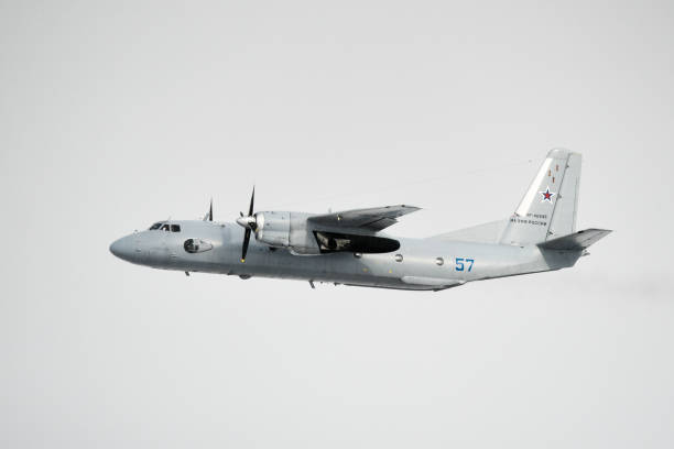 Russian Antonov An-26 plane Moscow, Russia - 26 Feb, 2018: Russian Antonov An-26 Curl military transport plane flying in the sky. antonov an 26 stock pictures, royalty-free photos & images