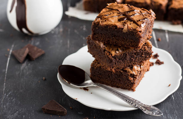 istock Chocolate brownie cake piece stack on plate homemade pastries 928453928