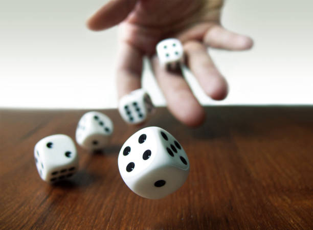 Rolling Dices Rolling Dices dice photos stock pictures, royalty-free photos & images