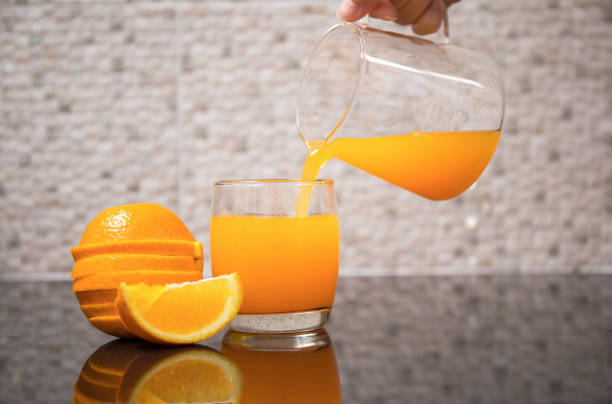 istock Fresh orange juice in the glass 928462662