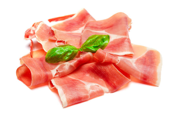 istock Italian prosciutto crudo or spanish jamon. Raw ham on white background. 928466138