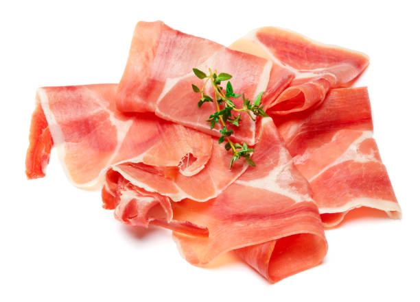 istock Italian prosciutto crudo or spanish jamon. Raw ham on white background. 928466604