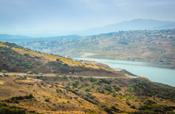 istock Desert road with Atlas Mountains, Morocco 928466876