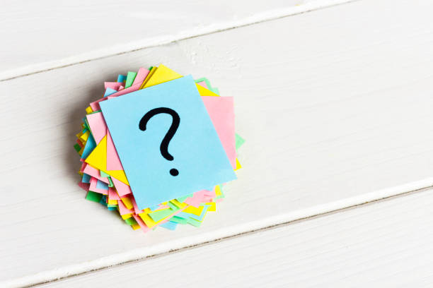 istock multicolored question marks written reminders tickets on white wooden background 928469738