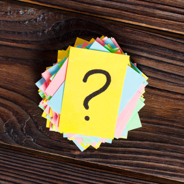 istock colorful question marks written reminders tickets on wooden background 928469746