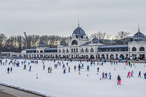 Budapest, Hungary - January 30, 2018: People ice skating outdoor in Budapest, Hungary.
