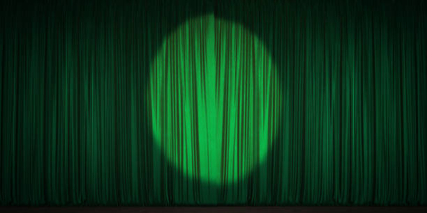 Green Velvet Theater Curtain Illuminated With A Spotlight