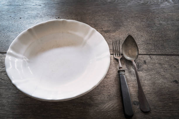 istock Vintage aged plate and cutlery 928473944