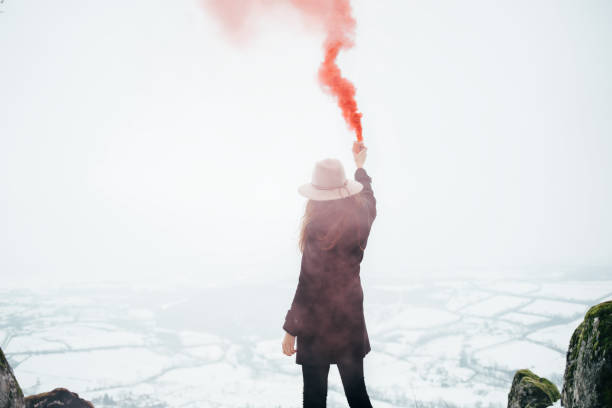 istock Hipster woman makes smoke signal 928477174