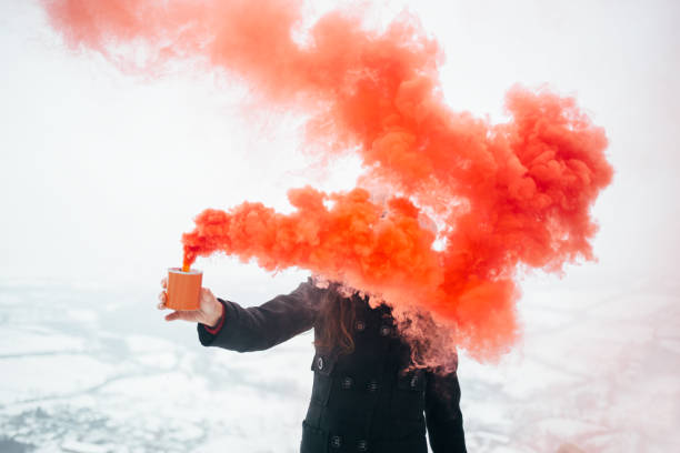 istock Hipster woman with smoke bomb 928477202