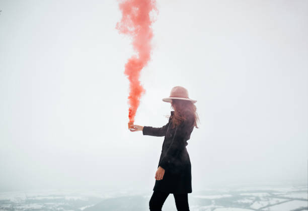 istock Woman make smoke signal 928477304