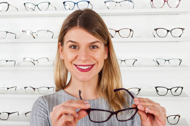 istock Woman choosing eyeglass 928478466