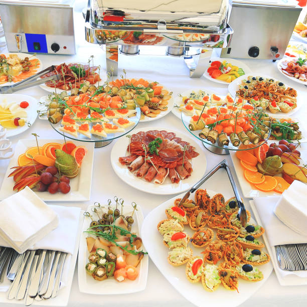 istock catering table set service with silverware and glass 928479004