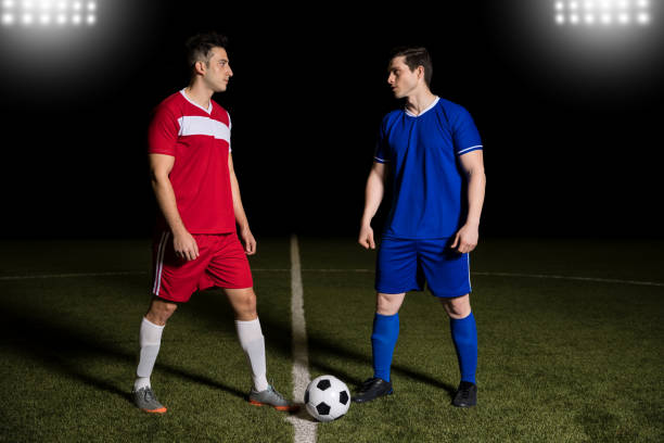 istock Footballers about to start a game 928484058