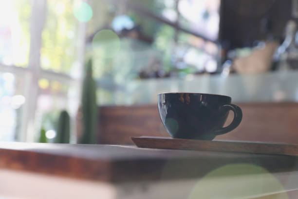 istock Cappuccino coffee break on wood background 928498312