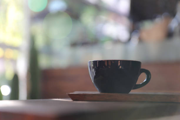 istock Cappuccino coffee break on wood background 928499020