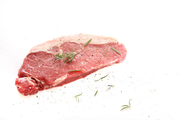 fresh raw beef steak with pepper and rosemary isolated in white background - scotch steak imagens e fotografias de stock