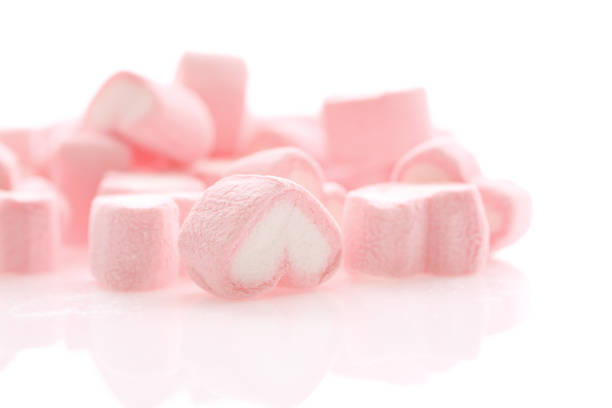 istock Pink Heart marshmallow isolated in white background 928504478