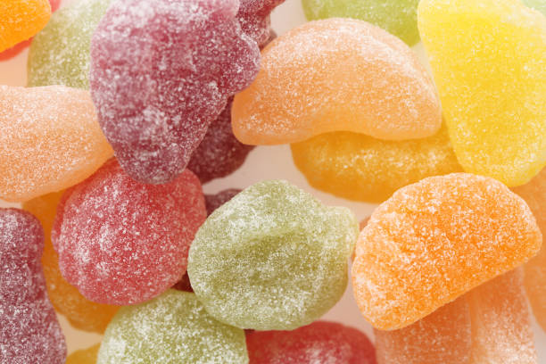 istock Colorful Fruit jelly candy isolated in white background 928504526