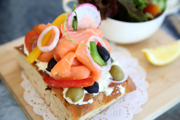 istock Smoked salmon on toast with salad vegetable 928504594